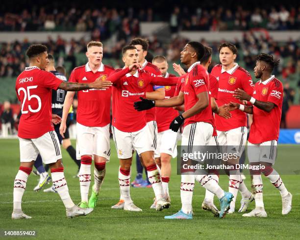 United players celebrate a goal during the Pre-Season friendly match between Melbourne Victory and Manchester United at Melbourne Cricket Ground on...
