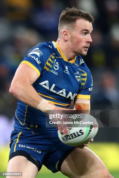 Clinton Gutherson of the Eels offloads the ball during the round 18 NRL match between the Parramatta Eels and the New Zealand Warriors at CommBank...