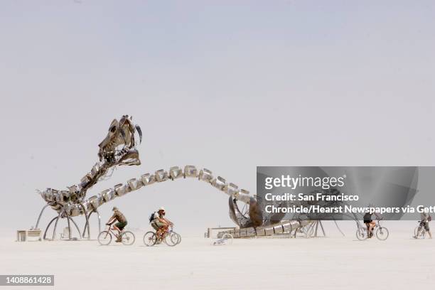 The Serpent Mother, a creation by The Flaming Lotus Girls of San Francisco, Ca., stands silent near the conclusion of the Burning Man Festival on...