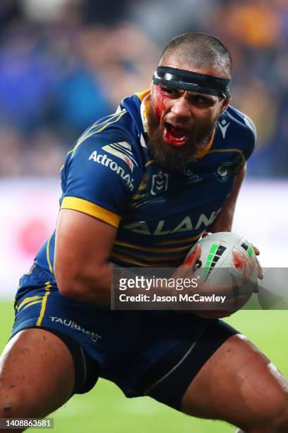 Isaiah Papali'i of the Eels celebrates after scoring a try during the round 18 NRL match between the Parramatta Eels and the New Zealand Warriors at...