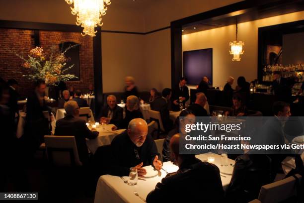 The dining room at the new Quince restaurant. Quince has moved into the old Myth space.