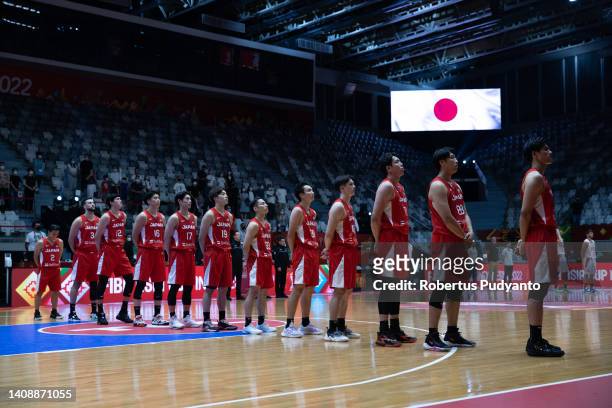 Japan team sing their national anthem during the FIBA Asia Cup Group C game between Syria and Japan at Istora Gelora Bung Karno on July 15, 2022 in...
