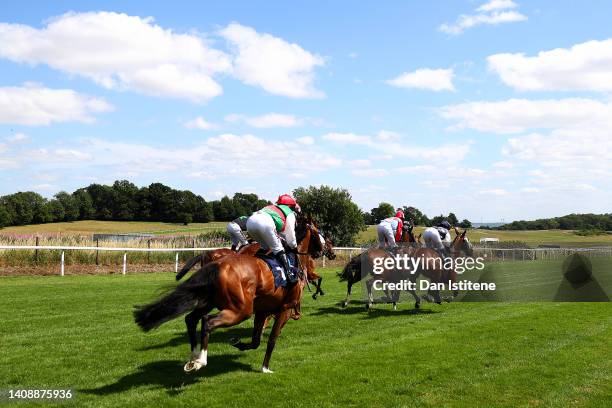 The runners and riders race in The Legal Protection Group Handicap Handicap Stakes at Chepstow Racecourse on July 14, 2022 in Chepstow, Wales.