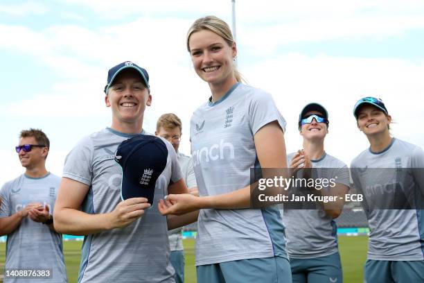 Lauren Bell of England receives her ODI cap from Heather Knight of England during the 2nd Royal London Series One Day International between England...