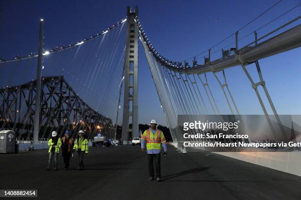 The new section of the San Francisco-Oakland Bay Bridge was lighted on Tuesday, August 11 as members of the MTC, Caltrans and the press took a...