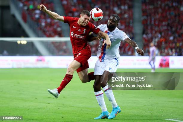 James Milner of Liverpool heads the ball against Odsonne Edouard of Crystal Palace during the first half of their preseason friendly at the National...