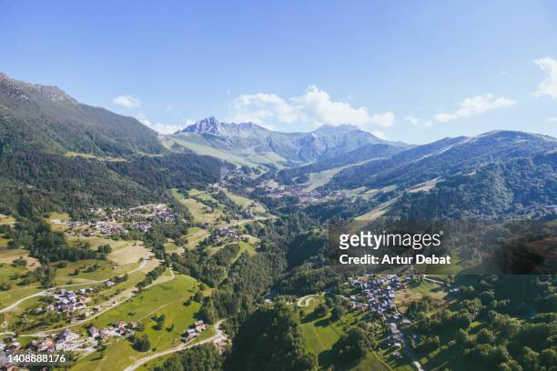 aerial view of the valmorel valley in the french rhone alps. - auvergne rhône alpes stockfoto's en -beelden