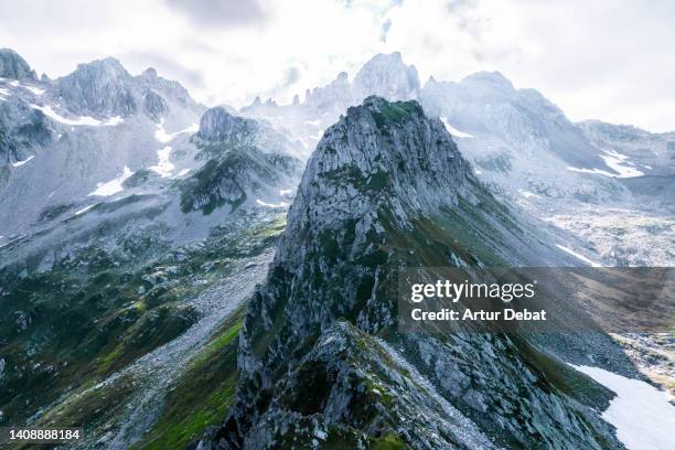 majestic view taken with drone of the peak formations in the french alps. - alps stock pictures, royalty-free photos & images