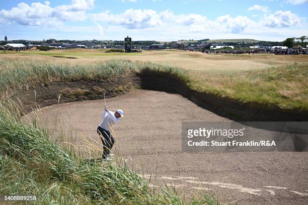 Tiger Woods of the United States plays a shot out of hells bunker on the 14th hole during Day Two of The 150th Open at St Andrews Old Course on July...