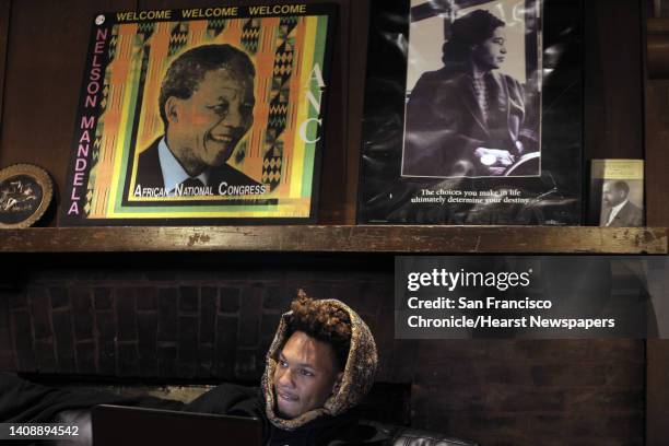 Mylo Mu, listens to other members of the demands committee, part of the Black Student Union at UC Berkeley, as they gathered at the Afro House in...