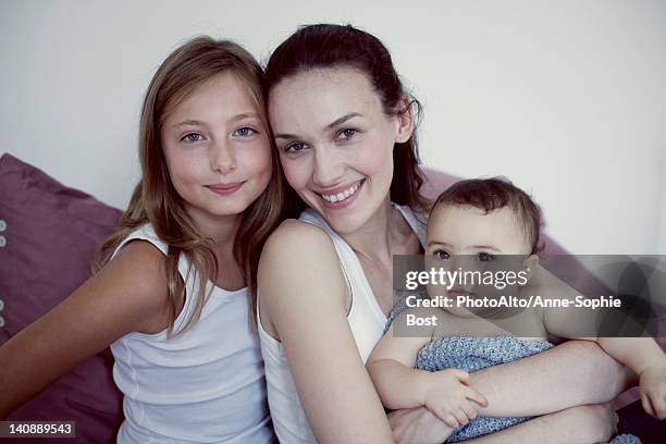 mother with daughter and baby, portrait - anne sophie mutter stock-fotos und bilder