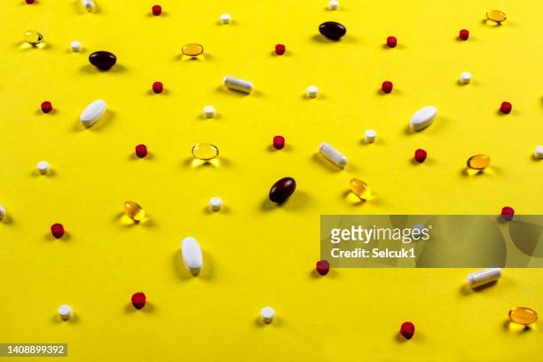 pills background. - opioid epidemic stock pictures, royalty-free photos & images