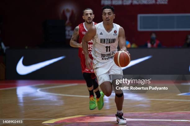 Flynn Cameron of New Zealand dribbles the ball during the FIBA Asia Cup Group D game between New Zealand and Lebanon at Istora Gelora Bung Karno on...