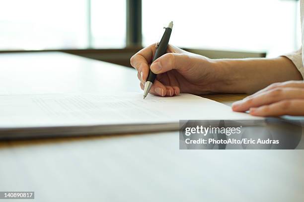 person signing document, cropped - contract ストックフォトと画像