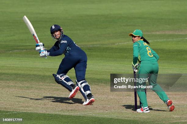 Sophia Dunkley of England bats as wicket keeper Trisha Chetty of South Africa looks on during the 2nd Royal London Series One Day International...