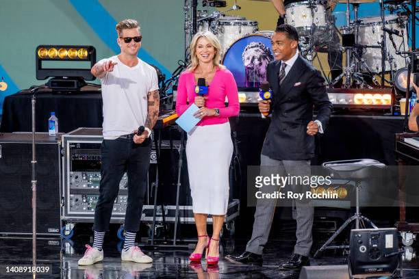 Vocalist Ryan Tedder of OneRepublic with hosts Amy Robach and T.J. Holmes as they perform on ABC's "Good Morning America" at Rumsey Playfield,...