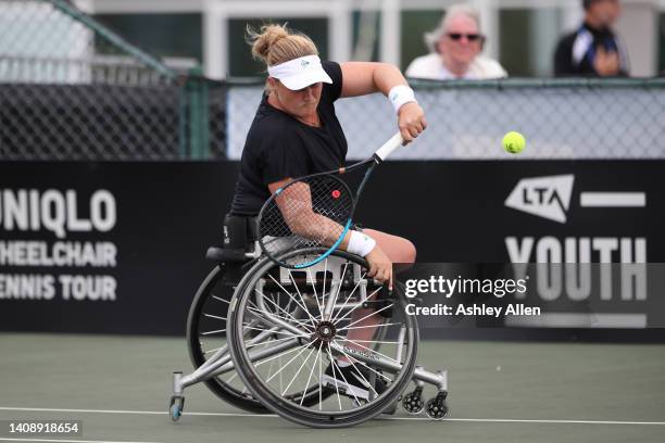 Aniek Van Koot of The Netherlands plays a backhand during her match against Zhenzhen Zhu of China on Day Four of the British Open Wheelchair Tennis...