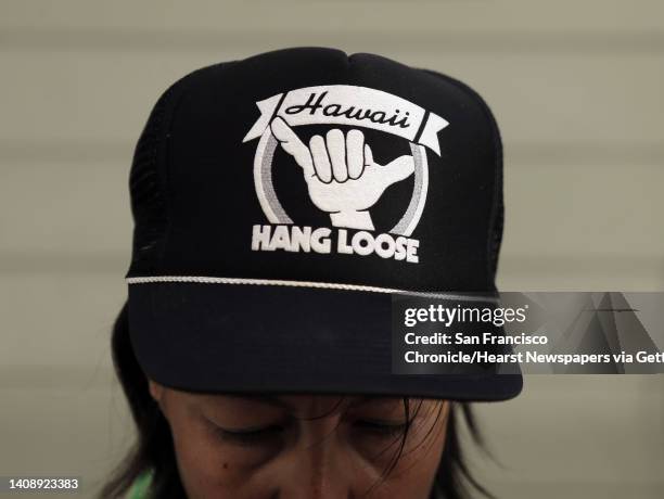 Assistant chef Nana Guardia wears a Hawaii Hang Loose hat as she and chef Ravi Kapur prepare Hawaiian-inspired dishes during Kapur's restaurant pop...