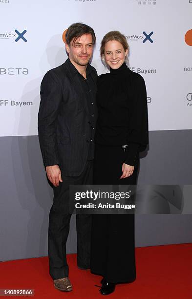 Actress Bernadette Heerwagen and her husband Ole Puppe attend the "Muenchen 72 - Das Attentat" Germany Premiere at Astor Film Lounge on March 7, 2012...