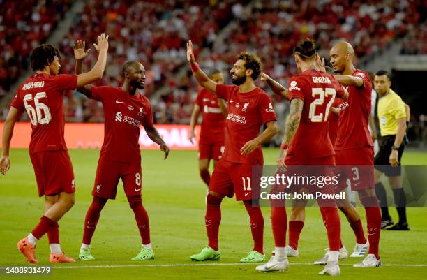 Mohamed Salah of Liverpool celebrates after scoring the second goal during the preseason friendly between Liverpool v Crystal Palace at National...