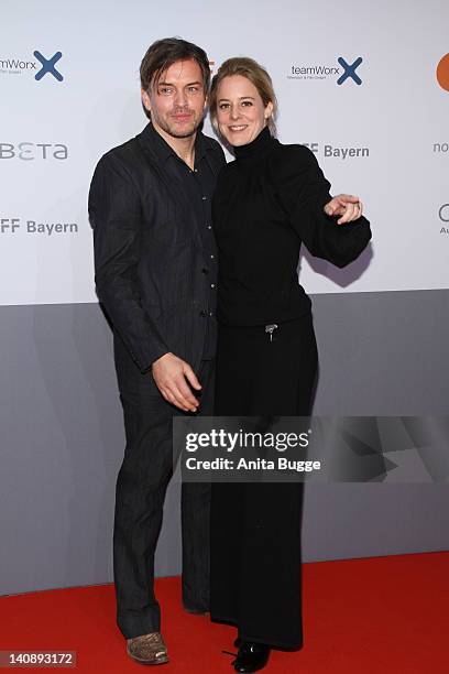 Actress Bernadette Heerwagen and her husband Ole Puppe attend the "Muenchen 72 - Das Attentat" Germany Premiere at Astor Film Lounge on March 7, 2012...