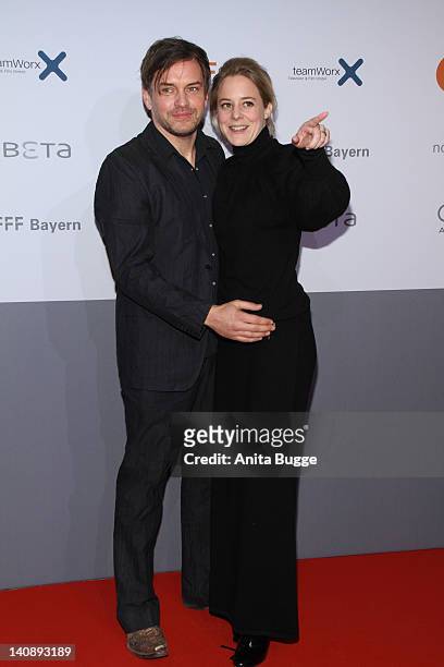 Actress Bernadette Heerwagen and her husband Ole Puppe attend the "Muenchen 72 - Das Attentat" Germany Premiere at Astor Film Lounge on March 7, 2012...