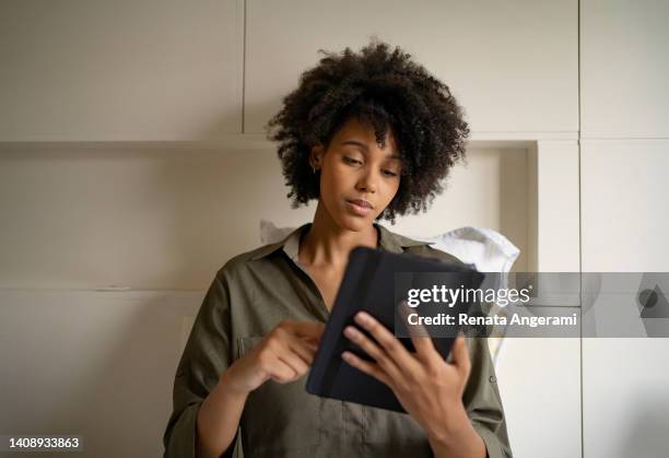 young woman studying at home. online learning concept. - quarantaine stock pictures, royalty-free photos & images