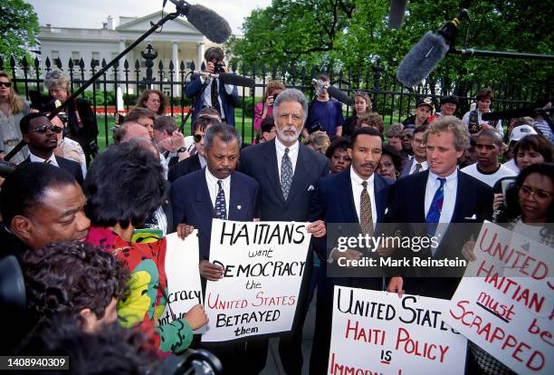 Members of the Congressional Black Caucus along with Congressman Joe Kennedy II protest in front of the White House the Clinton administration policy...