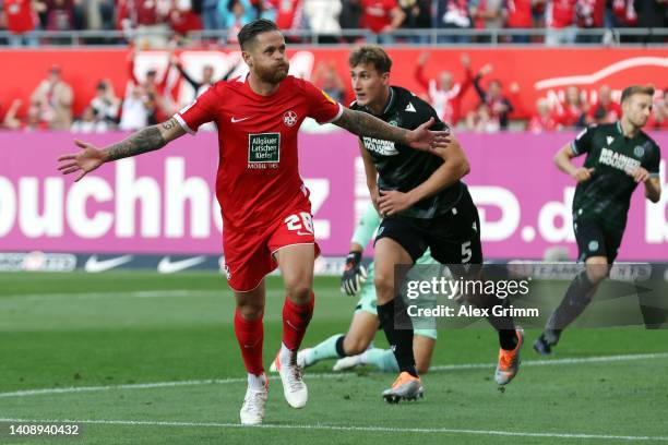 Mike Wunderlich of Kaiserslautern celebrates their team's first goal during the Second Bundesliga match between 1. FC Kaiserslautern and Hannover 96...