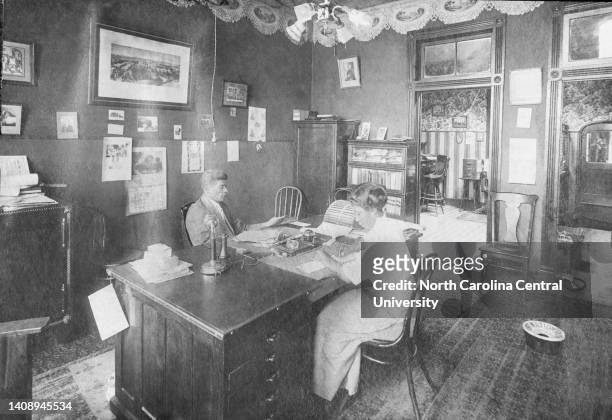 The Office of Charles Clinton Spaulding, Sr., General Manager with Susie V. Gille in 1906 in the Home Office of North Carolina Mutual and Provident...
