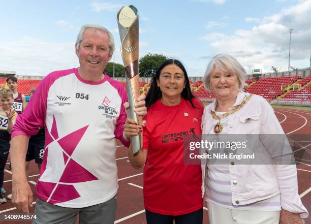 Batonbearer Sir Brendan Foster, Olympian Angela Gilmour and Cllr Dot Burnett - Mayor of Gateshead during the Birmingham 2022 Queen's Baton Relay on...