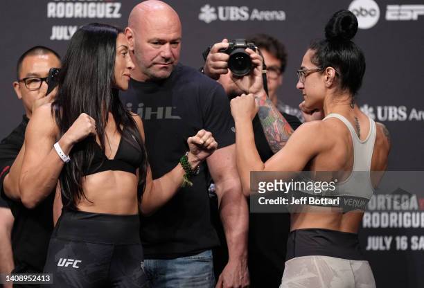 Opponents Jessica Penne and Emily Ducote face off during the UFC Fight Night ceremonial weigh-in at UBS Arena on July 15, 2022 in Elmont, New York.