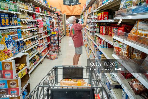 Customer shops in a Kroger grocery store on July 15, 2022 in Houston, Texas. U.S. Retail sales rose 1.0% in June according to the Commerce...