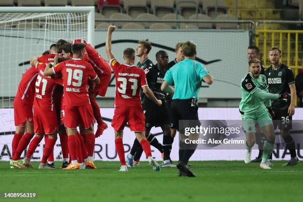 Kevin Kraus of Kaiserslautern celebrates their team's second goal with teammates during the Second Bundesliga match between 1. FC Kaiserslautern and...