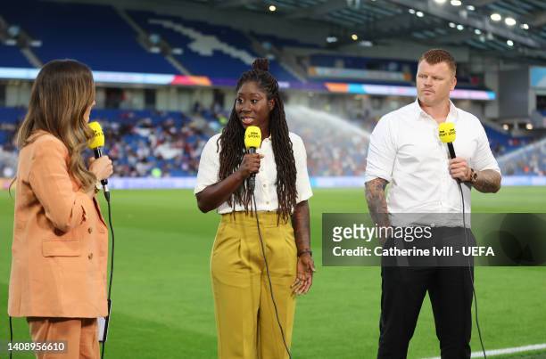 Presenters, Anita Asante and John Arne Riise speak prior to the UEFA Women's Euro 2022 group A match between Austria and Norway at Brighton & Hove...