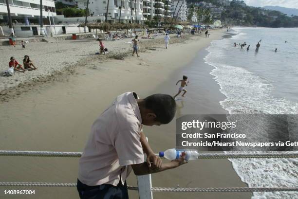 Roberto Carlos Montes Cantor is 14 and homeless. He spends his days fishing off the pier at Playa De Los Muertos with a fishing line tied around an...