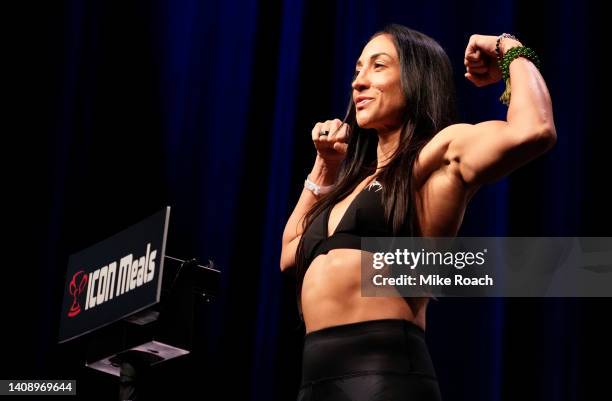 Jessica Penne poses on the scale during the UFC Fight Night ceremonial weigh-in at UBS Arena on July 15, 2022 in Elmont, New York.