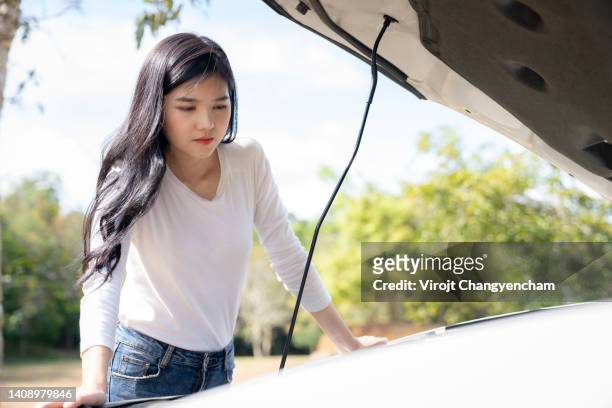 young female with broken car. - asian waiting angry expressions stock pictures, royalty-free photos & images