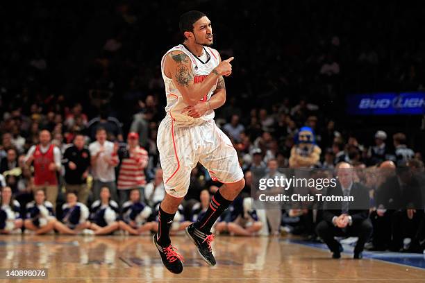 Peyton Siva of the Louisville Cardinals reacts after a basket in the second half against the Seton Hall Pirates during their second round game of the...