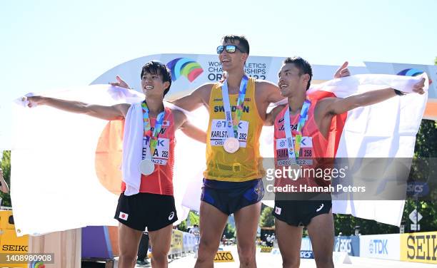 Silver medalist Koki Ikeda of Team Japan, bronze medalist Perseus Karlstrom of Team Sweden and gold medalist Toshikazu Yamanishi of Team Japan pose...