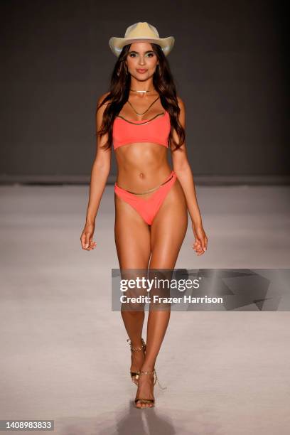 Leidy Amelia walks the runway for Kittenish By Jessie James Decker Swim Fashion Show presented By Klarna At Paraiso Miami Beach on July 15, 2022 in...