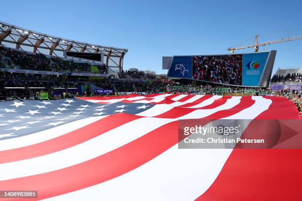 Members of the United States military hold an American flagduring the Opening Ceremony on day one of the World Athletics Championships Oregon22 at...