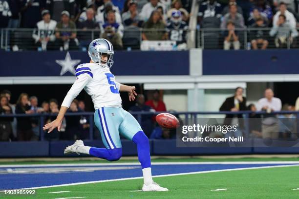 Bryan Anger of the Dallas Cowboys punts against the Las Vegas Raiders during an NFL game at AT&T Stadium on November 25, 2021 in Arlington, Texas.