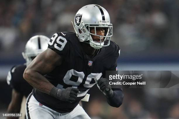 Clelin Ferrell of the Las Vegas Raiders defends against the Dallas Cowboys during an NFL game at AT&T Stadium on November 25, 2021 in Arlington,...