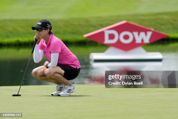 Karrie Webb of Australia lines up a putt on the fifth green during the third round of the Dow Great Lakes Bay Invitational at Midland Country Club on...