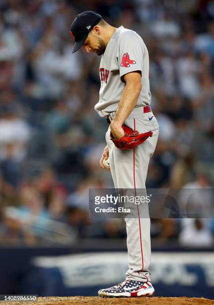 Nathan Eovaldi of the Boston Red Sox reacts after giving up a three run home run to Giancarlo Stanton of the New York Yankees in the third inning at...