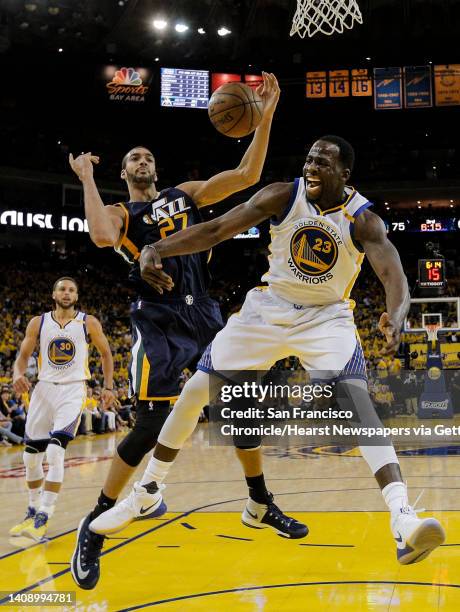 Golden State Warriors' Draymond Green fights Utah Jazz' Rudy Gobert for a rebound during Game 2 of the Western Conference Semifinals 2017 NBA...