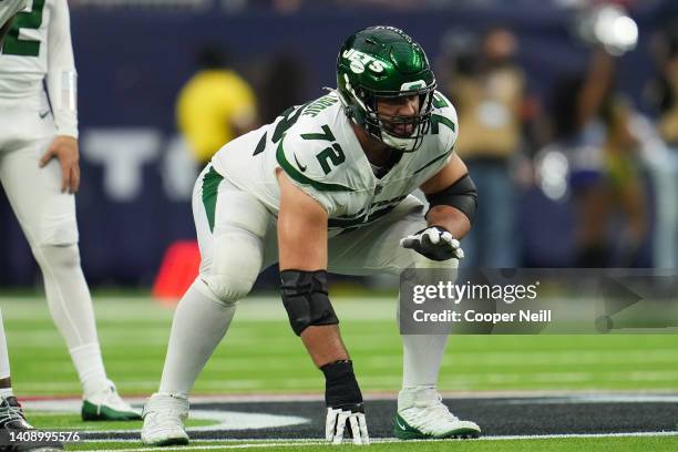 Laurent Duvernay-Tardif of the New York Jets gets set against the Houston Texans during an NFL game at NRG Stadium on November 28, 2021 in Houston,...