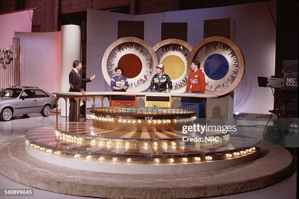 Pictured: Host: Pat Sajak with unknown contestants -- Photo by: Gene Arias/NBCU Photo Bank