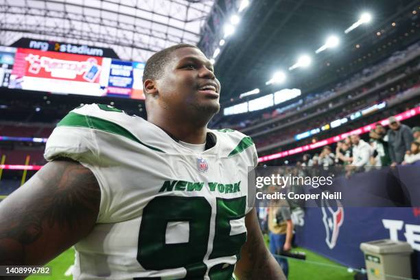 Quinnen Williams of the New York Jets celebrates against the Houston Texans after an NFL game at NRG Stadium on November 28, 2021 in Houston, Texas.